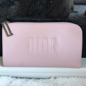Dior Make up bag in light pink, zipper pull has the D logo